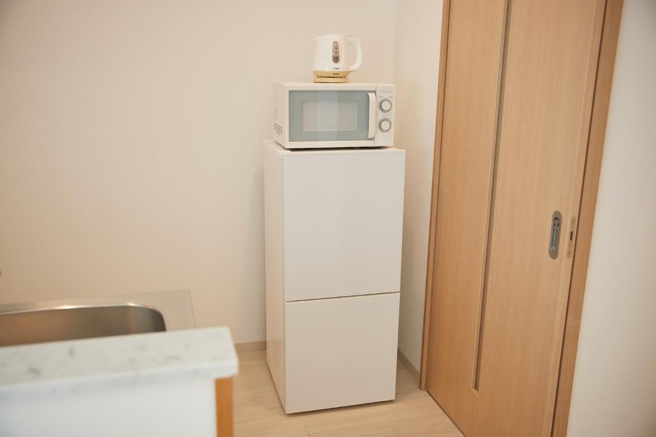 New Normal Hotel In Nago ニューノーマルホテルイン名護 Ngoại thất bức ảnh